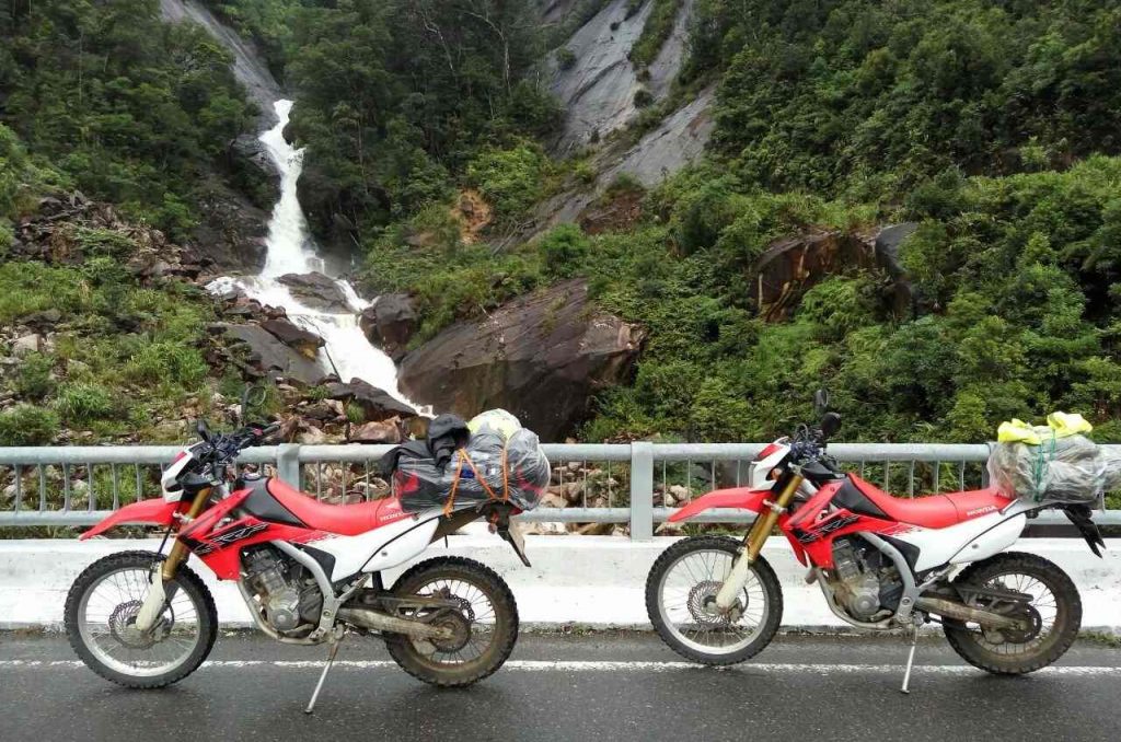 Crossing The Border With A Motorbike Between Vietnam And Laos